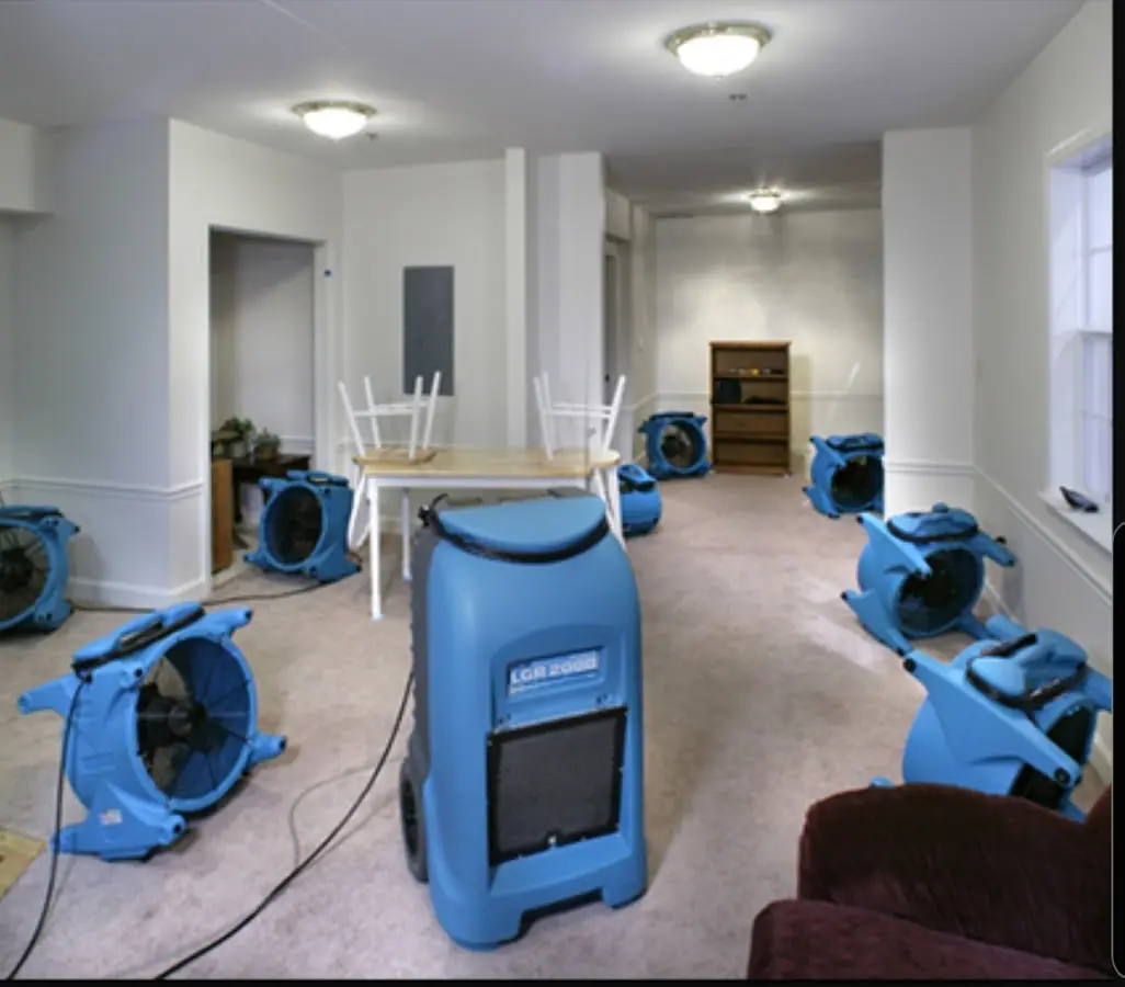 Air movers and dehumidifier setup for Water Damage Restoration in Holly Ridge